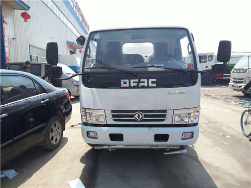 IMG_4328.jpg 東風藍牌灑水車右傾45度角圖片1.jpg